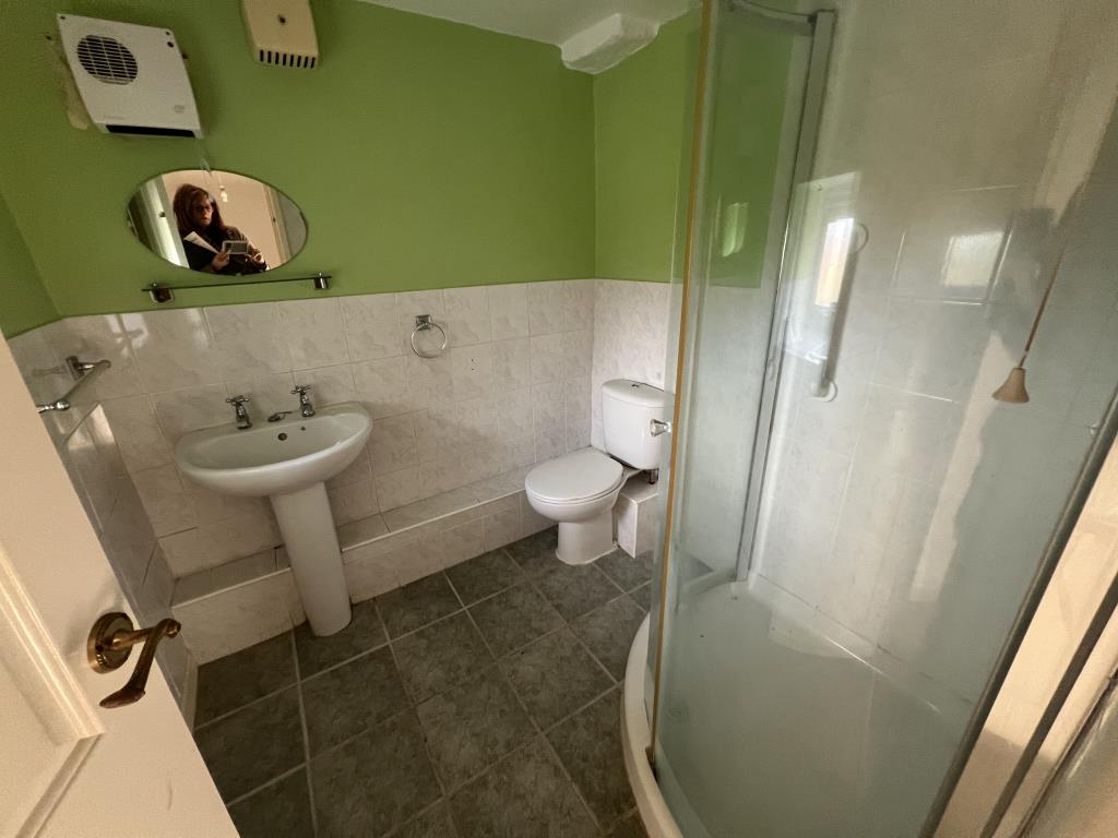 Lot: 131 - DETACHED COTTAGE FOR UPDATING - General view of upstairs shower room